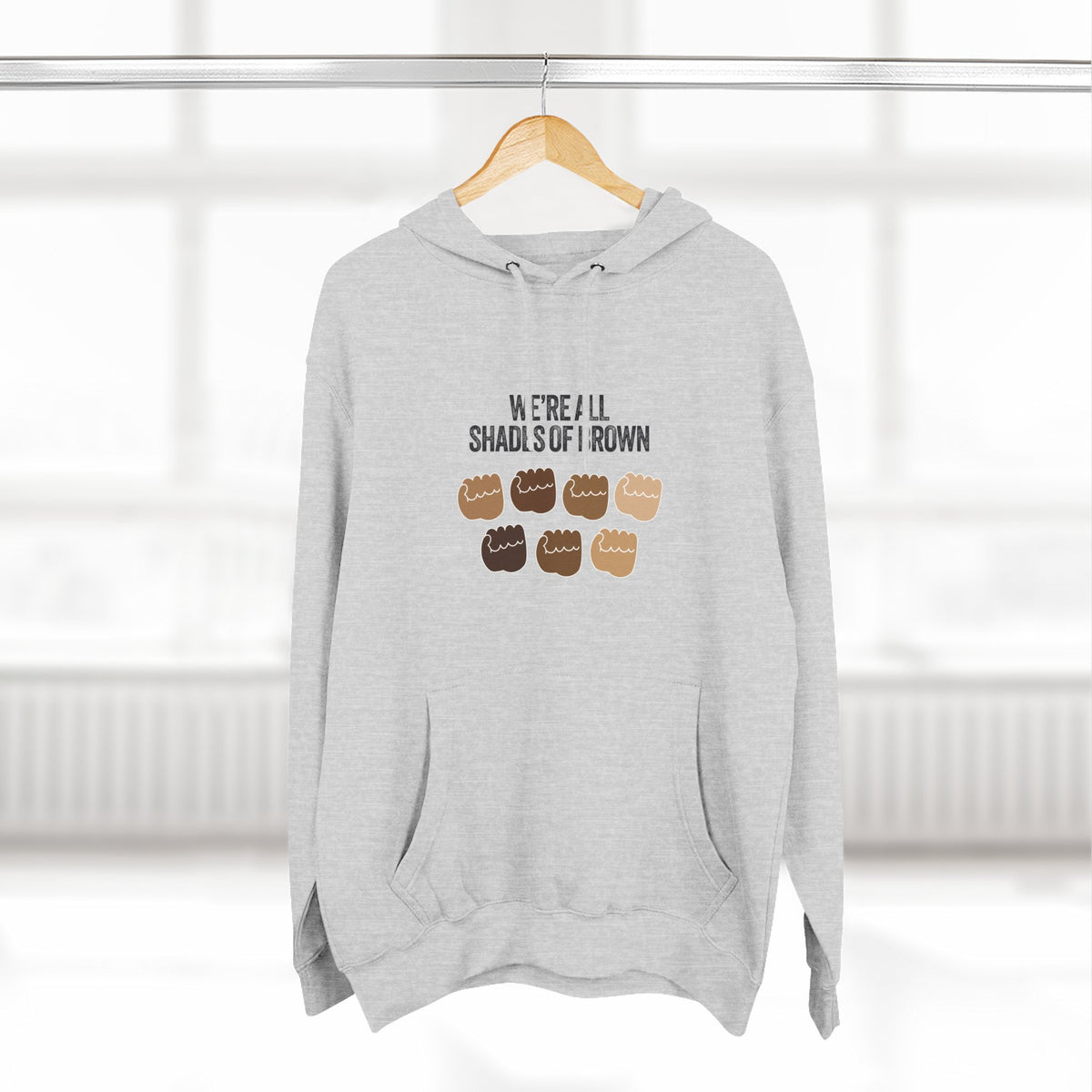 We're All Shades of Brown Hoodie — Unisex Heavy Blend™ Hooded Pouched Fist Pump BL